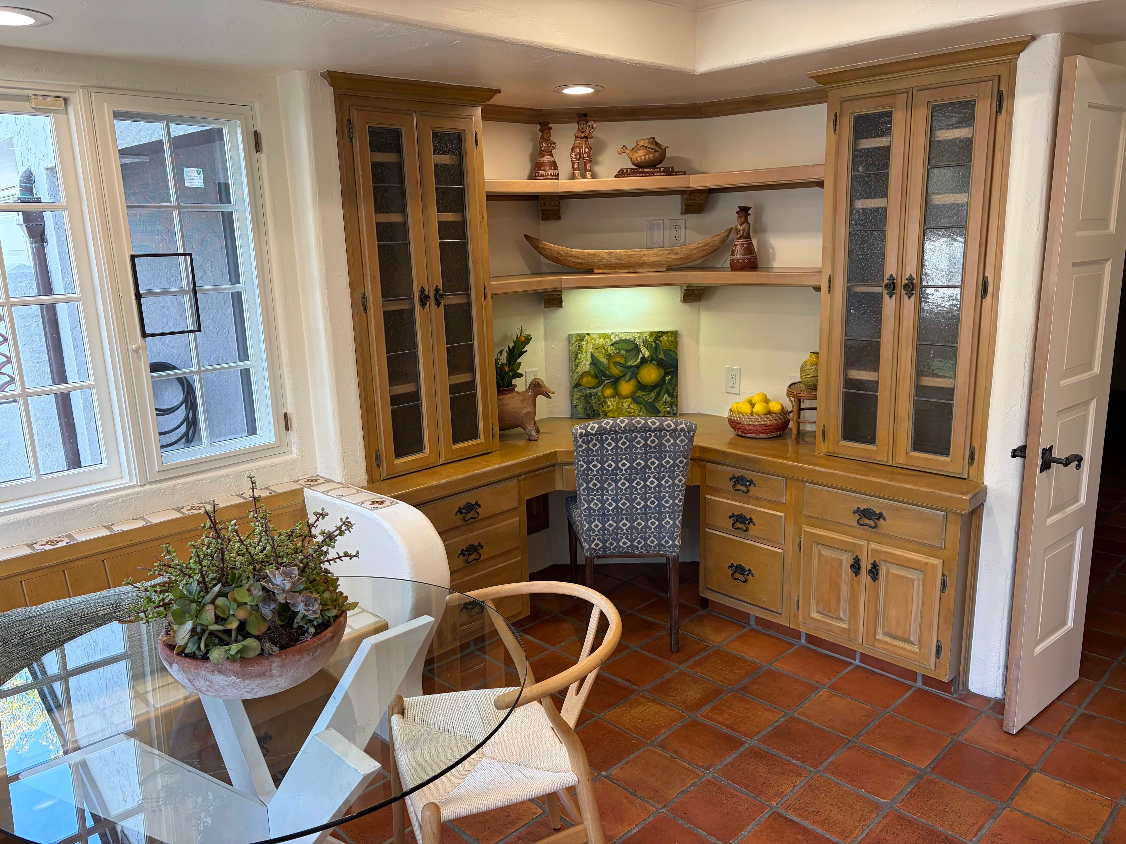 Designer kitchen with breakfast room and Spanish tile floors